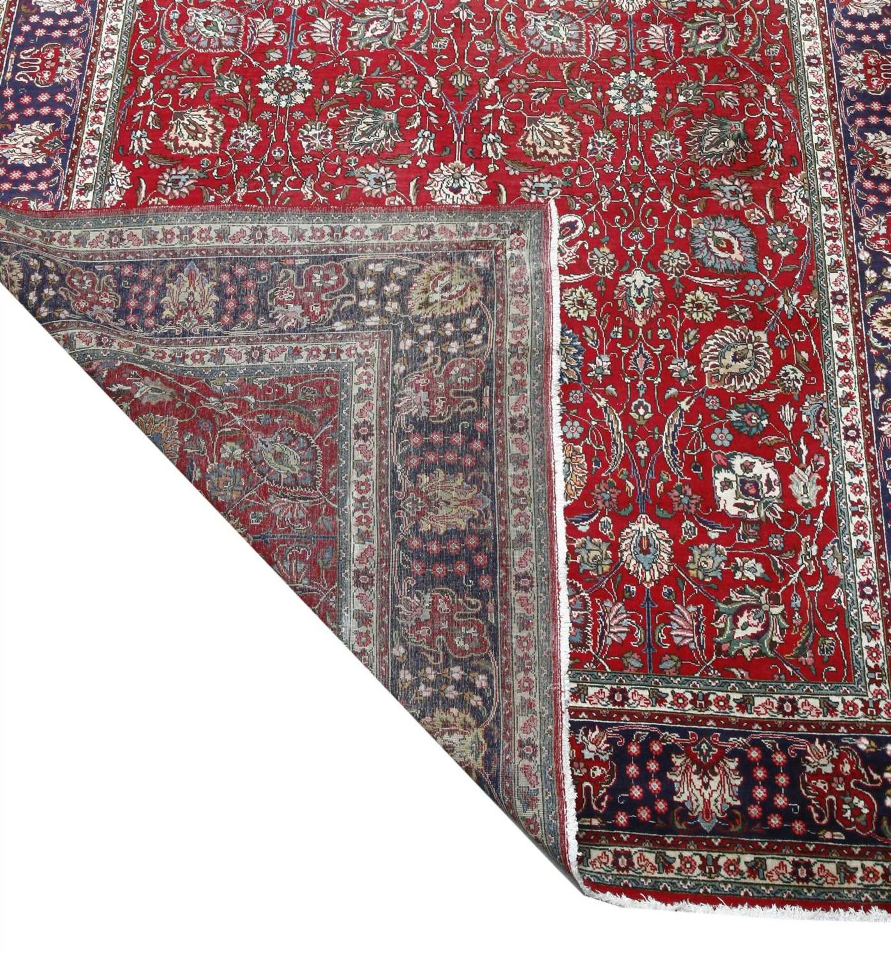 A large Tabriz carpet, - Image 2 of 2