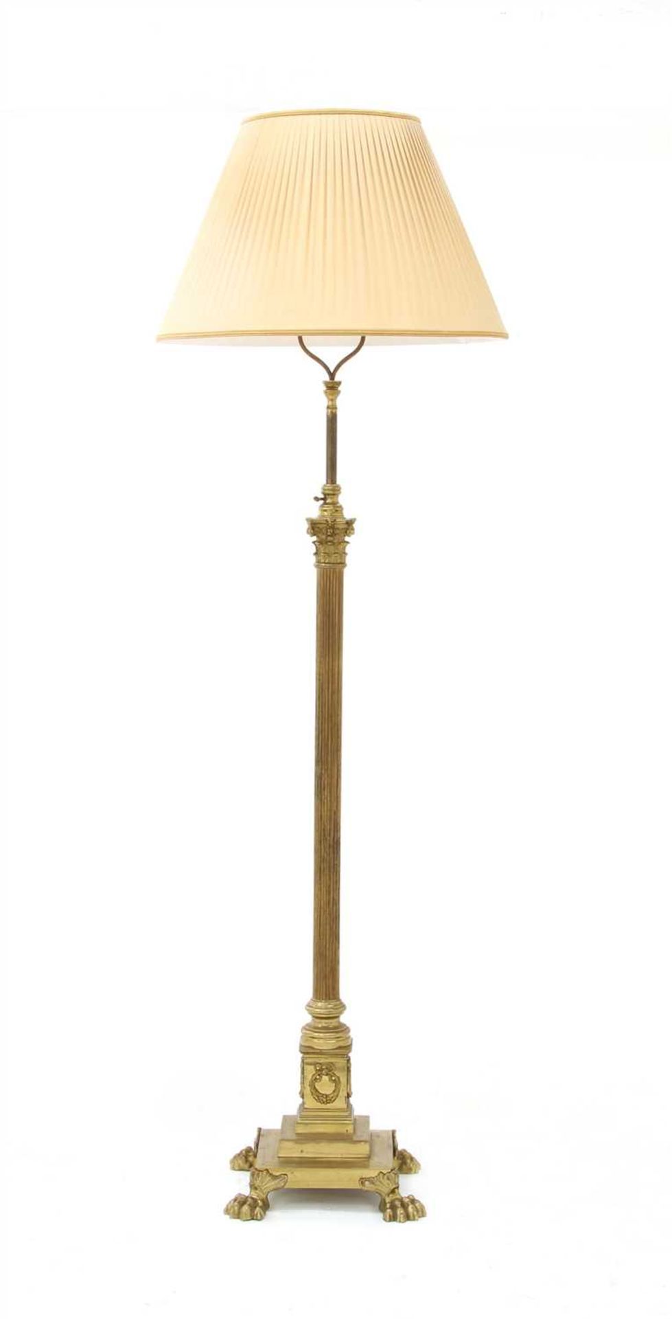 A brass Corinthian column standard lamp,