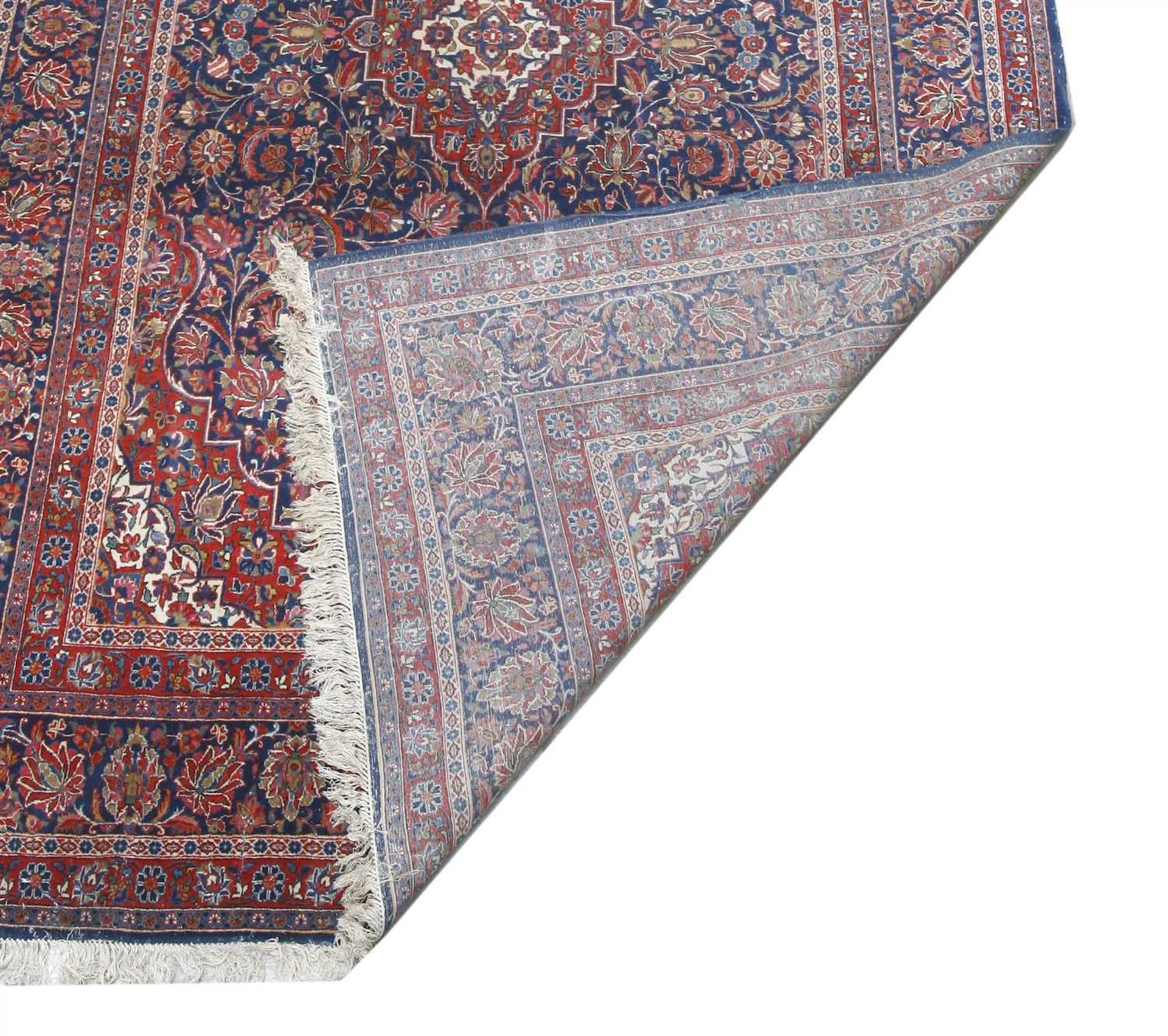 A Kashan carpet, - Image 2 of 2