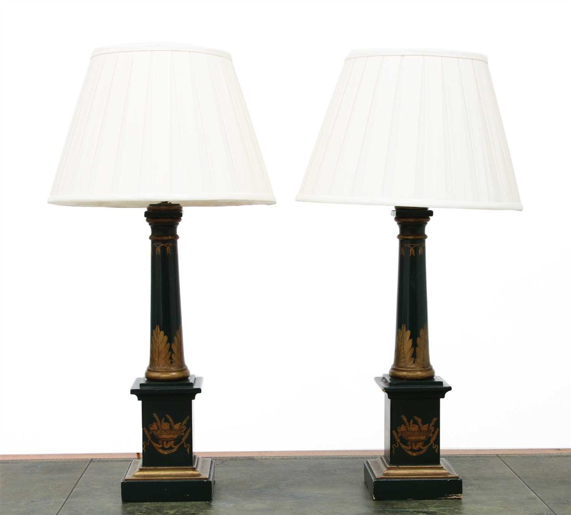 A pair of modern wooden table lamps,