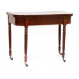 A George III strung mahogany fold-over card table,