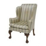 A wing armchair,