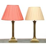 A pair of brass Corinthian column table lamps,