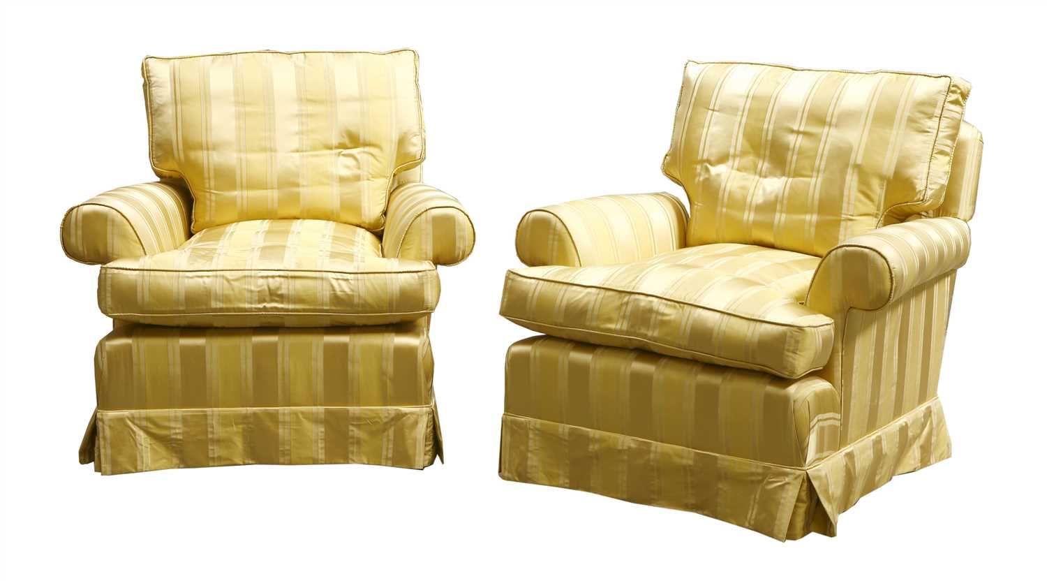 A pair of modern armchairs,