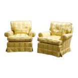 A pair of modern armchairs,