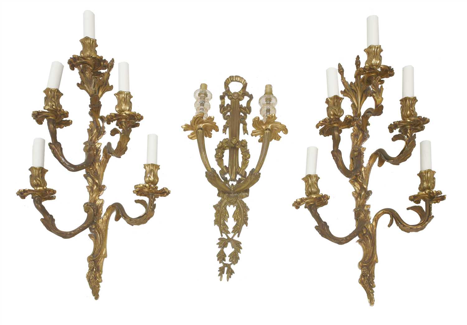 A pair of bronze five-branch wall lights,