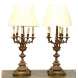 A pair of brass six-light table lamps,