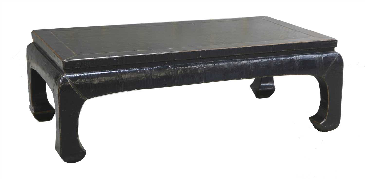 An Oriental black lacquered coffee table,