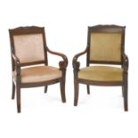 A pair of French mahogany Empire elbow chairs,