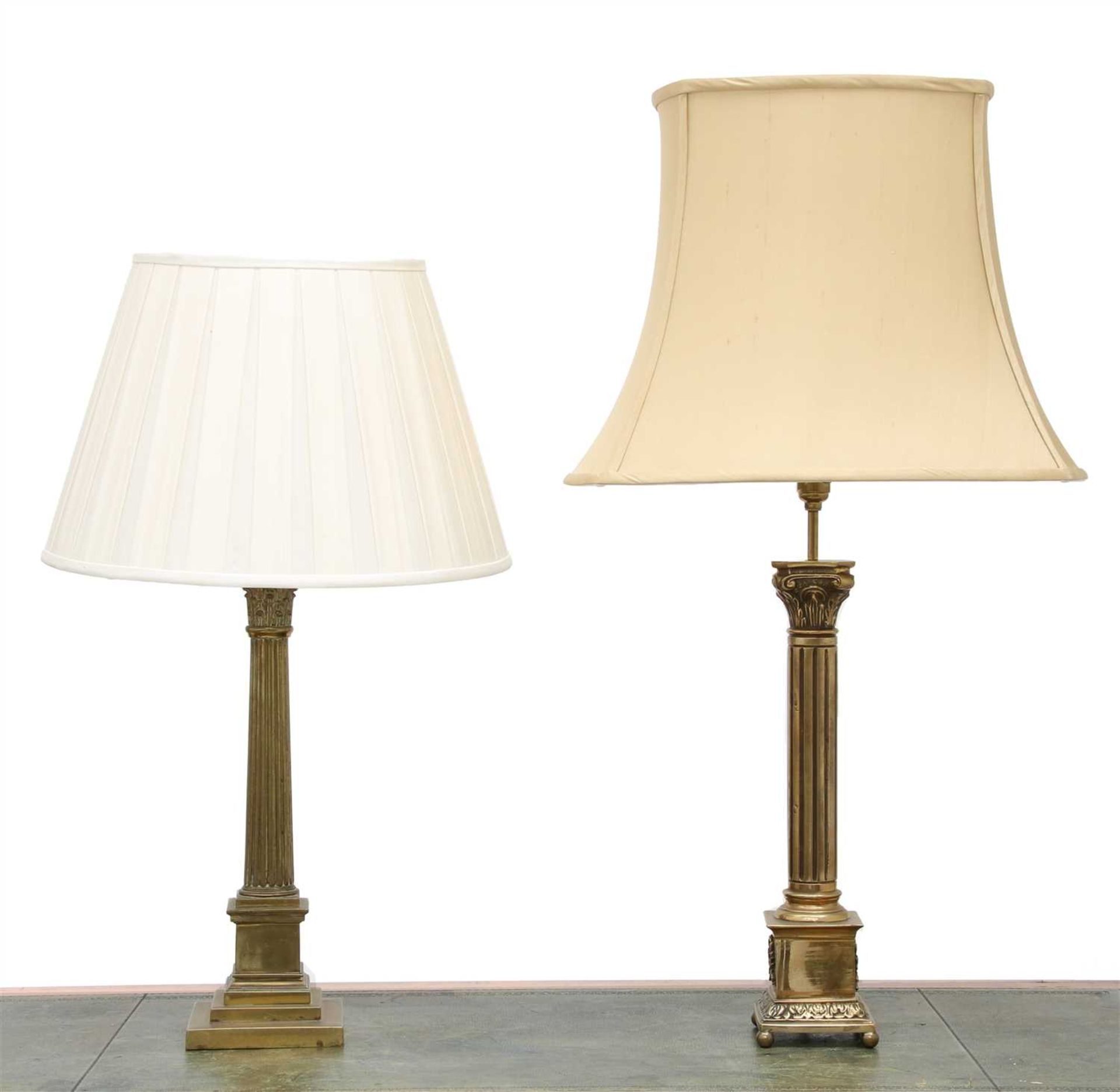 Two brass Corinthian column table lamps,