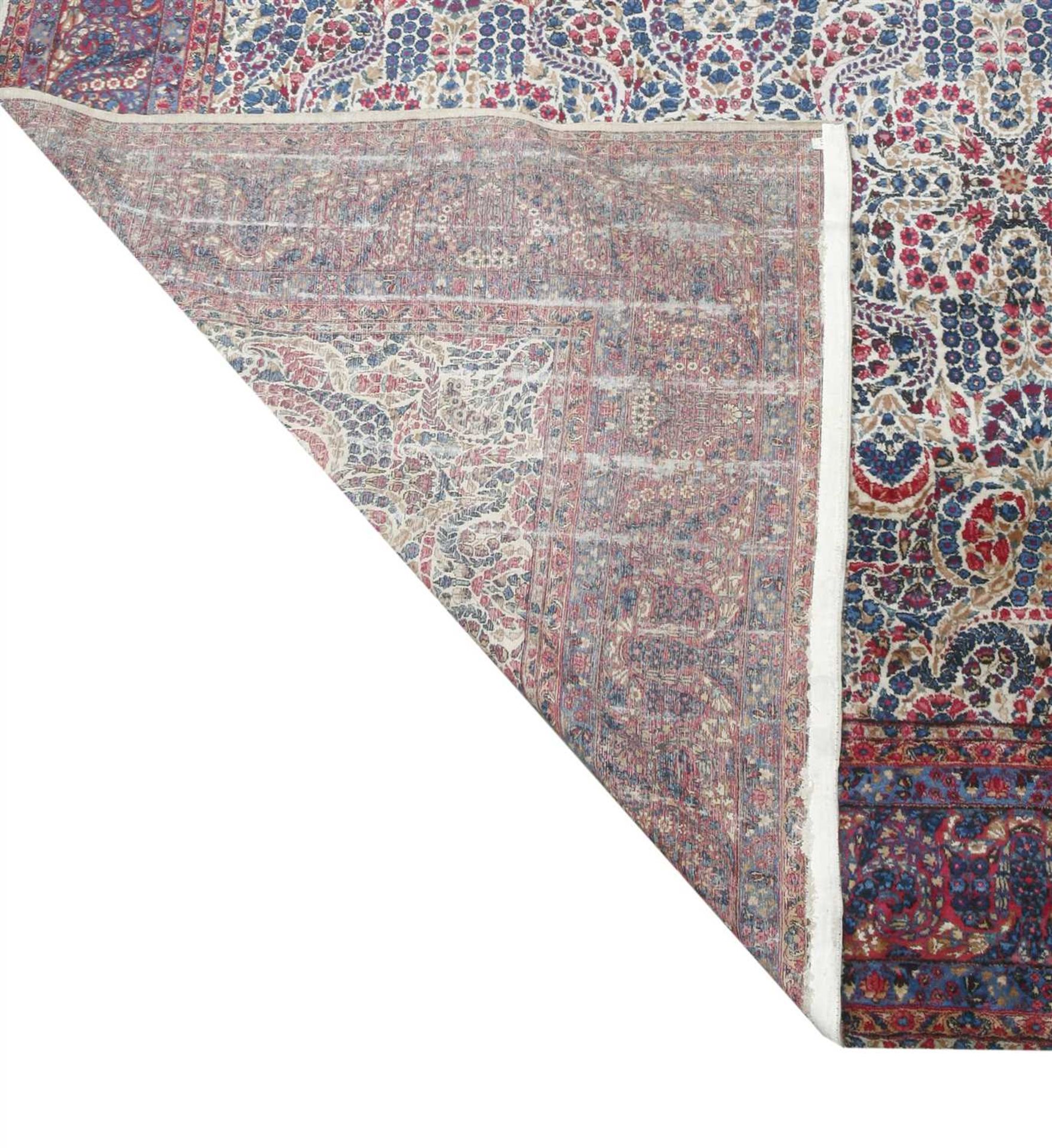 A large Kirman carpet, - Image 2 of 2