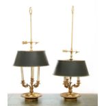 A pair of brass three-light table lamps,