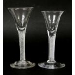 Two Georgian glass air twist wine glasses, each with transparent bowls, both chipped, 15.5cm and