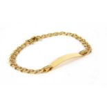 A gold identity bracelet