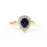 A sapphire and diamond pear shaped cluster ring