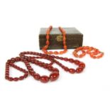 A single row of graduated olive shaped Bakelite beads