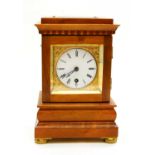 A modern Regency style mantel clock,