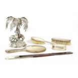 A silver part dressing table set