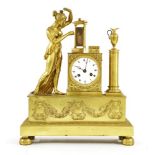 A large gilt metal mantel clock,