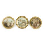 Two pairs and two single circular gilt frames,