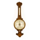 A large 19th century walnut wheel barometer