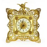 A Continental gilt metal strut-form clock,
