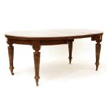 A late Victorian mahogany dining table,