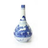A Kangxi style blue and white bottle vase,