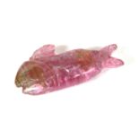 A carved pink tourmaline fish