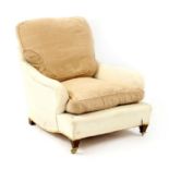 A low Howard style armchair,