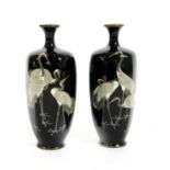A pair of Japanese cloisonne hexagonal baluster vases,