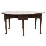 A George II oak drop-leaf table,