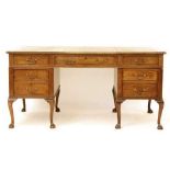 A mahogany twin pedestal desk,