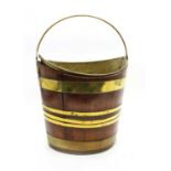 A mahogany and brass bound bucket,
