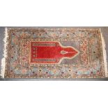 A Persian prayer rug,