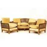 A mahogany framed bergere suite,