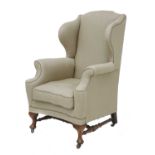 A wing armchair,