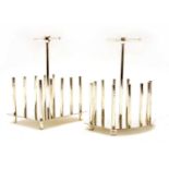 Two silvered toast racks designed by Dresser