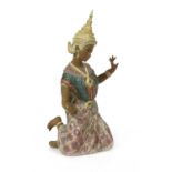 A Lladro Thai girl kneeling figure,