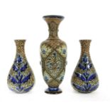 A pair of Doulton Lambeth Stoneware vases,