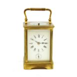 A brass cased carriage clock with repeater movement,