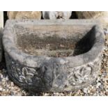 A composite stone trough,