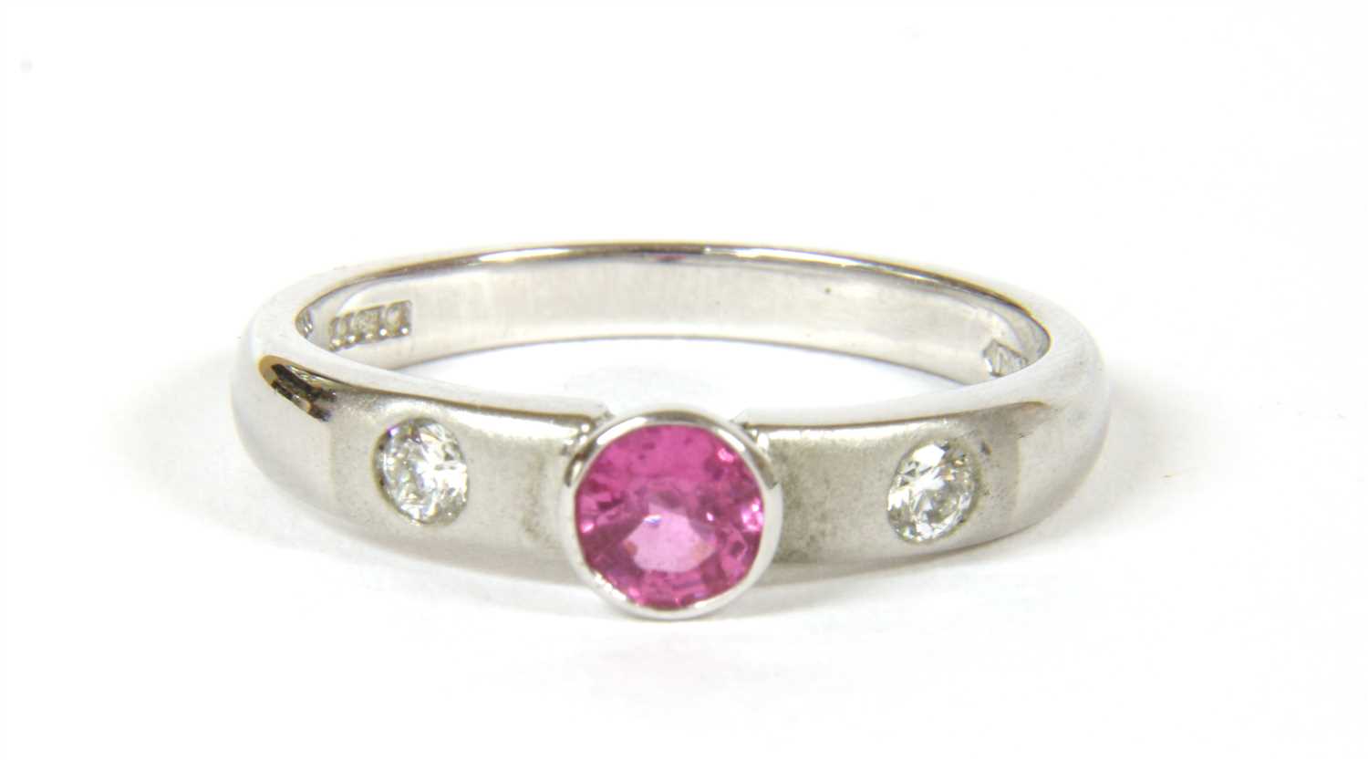 An 18ct white gold single stone pink sapphire ring