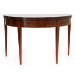 A George III strung mahogany D-shaped tea table