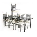 A refectory style granite topped dining table and eight chairs,