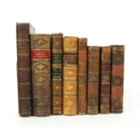 A large quantity of mixed cloth and leather bound books