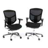 Two modern 'Enjoy' pneumatic office chairs