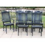 An Alexander Rose ebonised garden table and eight chairs,