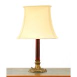 A brass table lamp,