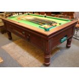 A slate top pool table,